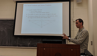 Student presenting a topic in a classroom.
