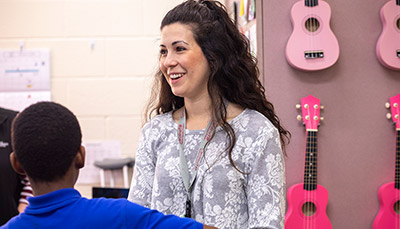music teacher talking to students